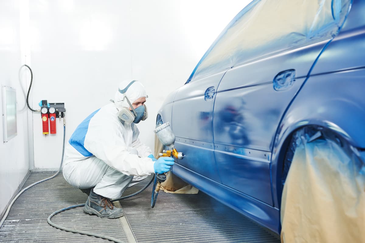 Mechanic working on a car
